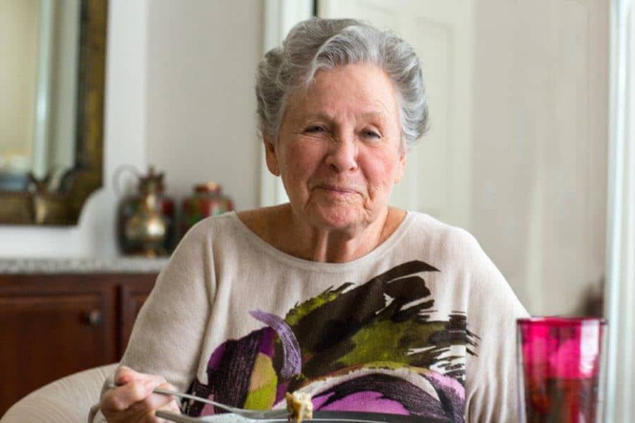 Senior woman having dinner